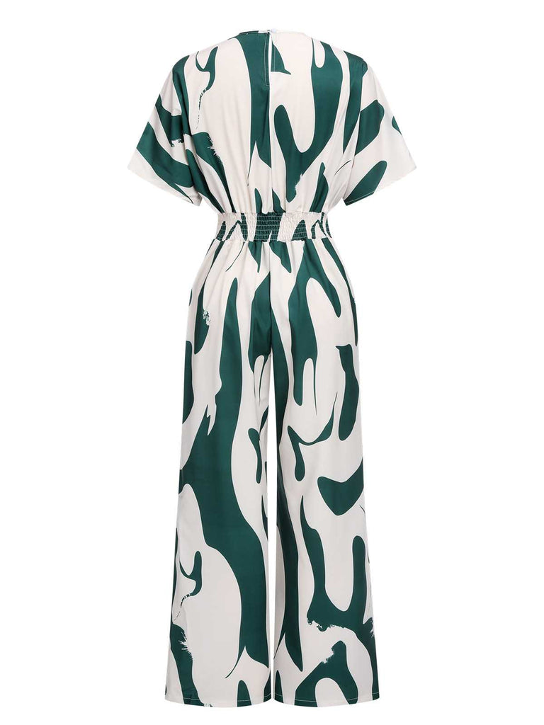 This Green 1940s Print Wide-Leg Jumpsuit whispers 1940s secrets to those who notice