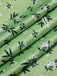 Green 1940s V-Neck Ditsy Floral Dress — the kind of 1940s dress that makes strangers smile