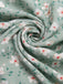Green 1940s V-Neck Ditsy Floral Irregular Hem Dress — the kind of 1940s dress that makes strangers smile