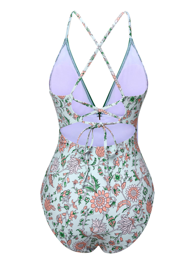This Green 1950s Floral Spaghetti Strap Swimsuit carries 1950s vacation dreams in every stitch