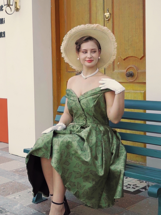 She slips into this Green 1950s Off-Shoulder Vintage Dress and suddenly it's a 1950s daydream
