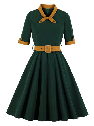She slips into this Green 1950s Tie Neck Contrast Patchwork Dress and suddenly it's a 1950s daydream