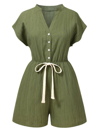 She finds her 1950s story in this Green 1950s V-Neck Textured Pocket Romper