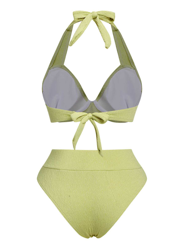 This Green 1960s Halter High-Waist Swimsuit carries 1960s vacation dreams in every stitch