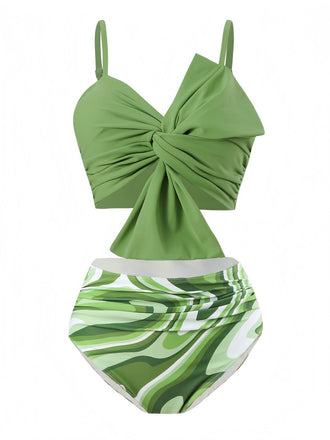 She's wearing Green 1960s Knotted Watercolor Straps Swimsuit and the whole beach remembers the 1960s