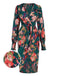 She slips into this Green 1980s Surplice Floral Tulip Hem Dress and suddenly it's a 1980s daydream