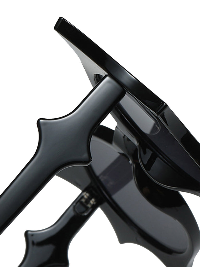 She finds her vintage story in this Halloween Bat Wing Gothic Sunglasses