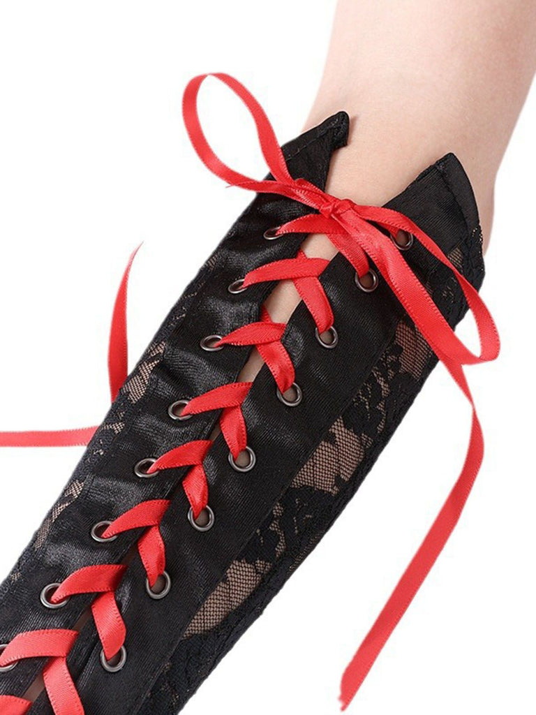 She adds this Halloween Punk Party Lace-Up Half Finger Gloves and suddenly it's vintage perfection