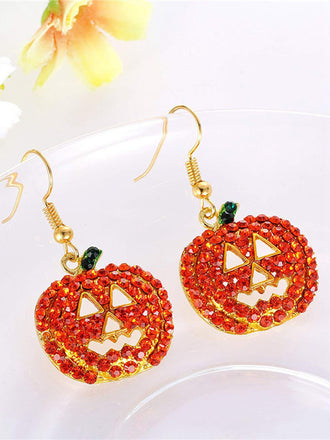 She adds this Halloween Rhinestones Grimace Pumpkin Earrings and suddenly it's vintage perfection