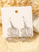 She adds this Hollow Numbers 2025 New Year's Eve Earrings and suddenly it's vintage perfection
