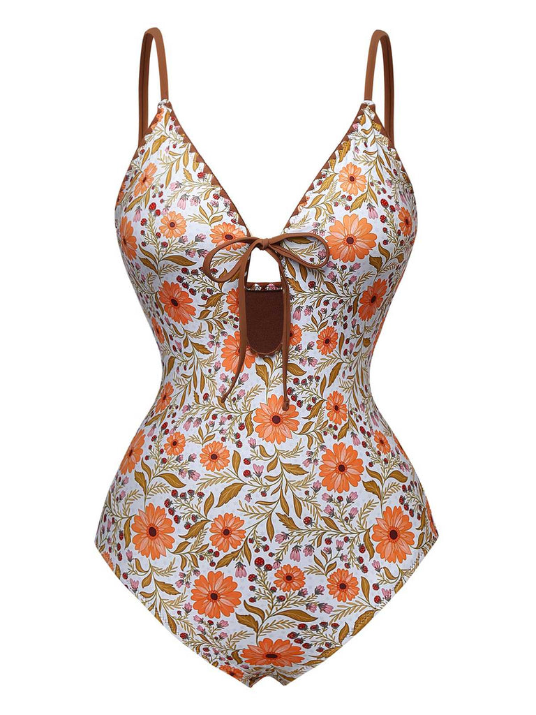 She's wearing Khaki 1950s Floral Keyhole One-Piece Swimsuit and the whole beach remembers the 1950s