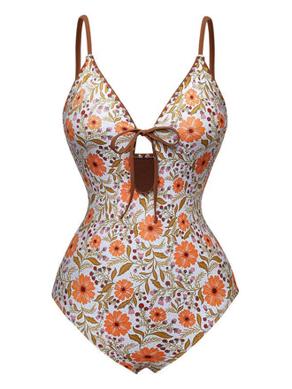 She's wearing Khaki 1950s Floral Keyhole One-Piece Swimsuit and the whole beach remembers the 1950s