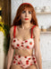 She's wearing Lace Strawberry Cami Tankini Set and the whole beach remembers the vintage