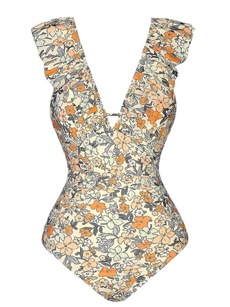 This 1950s Floral Ruffled Back Cut-Out Swimsuit carries 1950s vacation dreams in every stitch