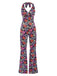 She finds her 1970s story in this Multicolor 1970s Hippie Floral Halter Jumpsuit
