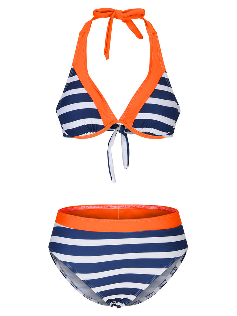 She's wearing Orange & Blue 1960s Halter Striped Swimsuit and the whole beach remembers the 1960s