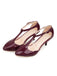 She finds her vintage story in this Patent Leather T-Strap Mary Jane Kitten Heels