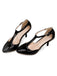 She finds her vintage story in this Patent Leather T-Strap Mary Jane Kitten Heels