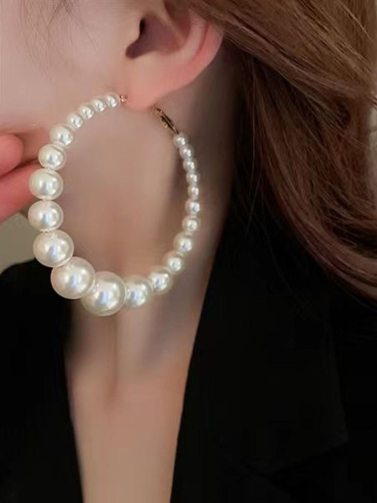 This Pearl Large Hoop Vintage Earrings carries 1950s stories waiting to be told