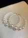 Pearl Large Hoop Vintage Earrings — the 1950s finishing touch that makes her outfit sing