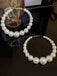 This Pearl Large Hoop Vintage Earrings carries 1950s stories waiting to be told