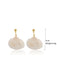 She adds this Mermaid Tail Seashell Dangle Earrings and suddenly it's vintage perfection