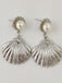 She adds this Shell Earrings and suddenly it's vintage perfection