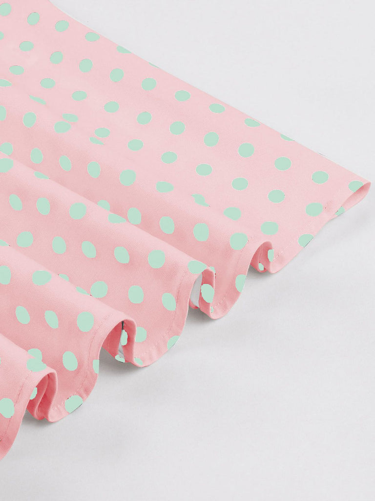 Pink 1950s Blue Polka Dot Lapel Dress — the kind of 1950s dress that makes strangers smile