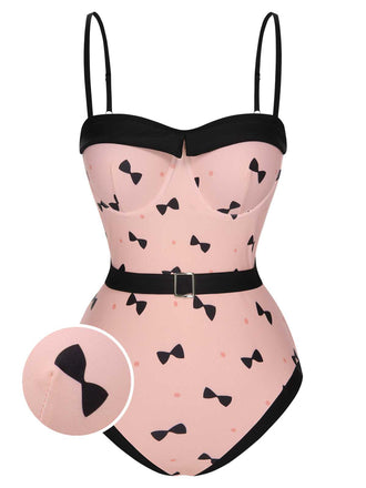 She's wearing Pink 1950s Bow Polka Dots Print One-Piece Swimsuit and the whole beach remembers the 1950s
