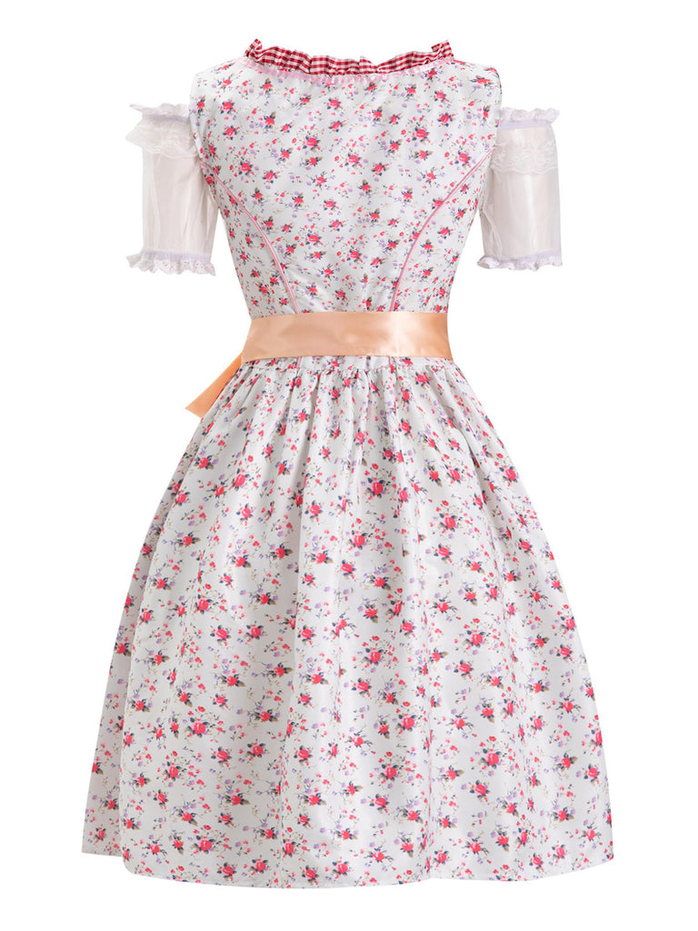 This Pink 1950s Ditsy Floral Lace Dress & Gingham Apron wraps her in 1950s elegance, one twirl at a time