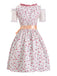 This Pink 1950s Ditsy Floral Lace Dress & Gingham Apron wraps her in 1950s elegance, one twirl at a time