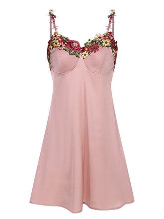 She slips into this Pink 1950s Flower Embroidered Suspender Nightgown and suddenly it's a 1950s daydream