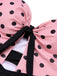 She's wearing Pink 1950s Halter Polka Dots One-Piece Swimsuit and the whole beach remembers the 1950s