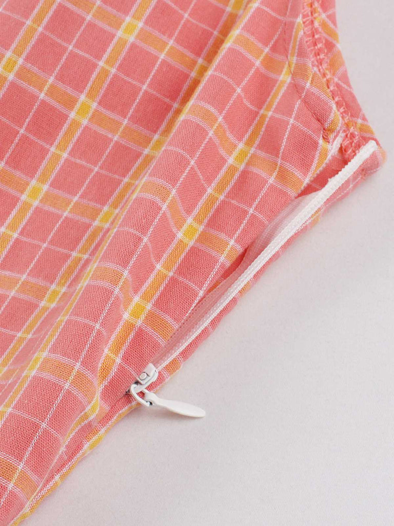 Pink 1950s Plaid Buttoned Lapel Belted Dress — the kind of 1950s dress that makes strangers smile