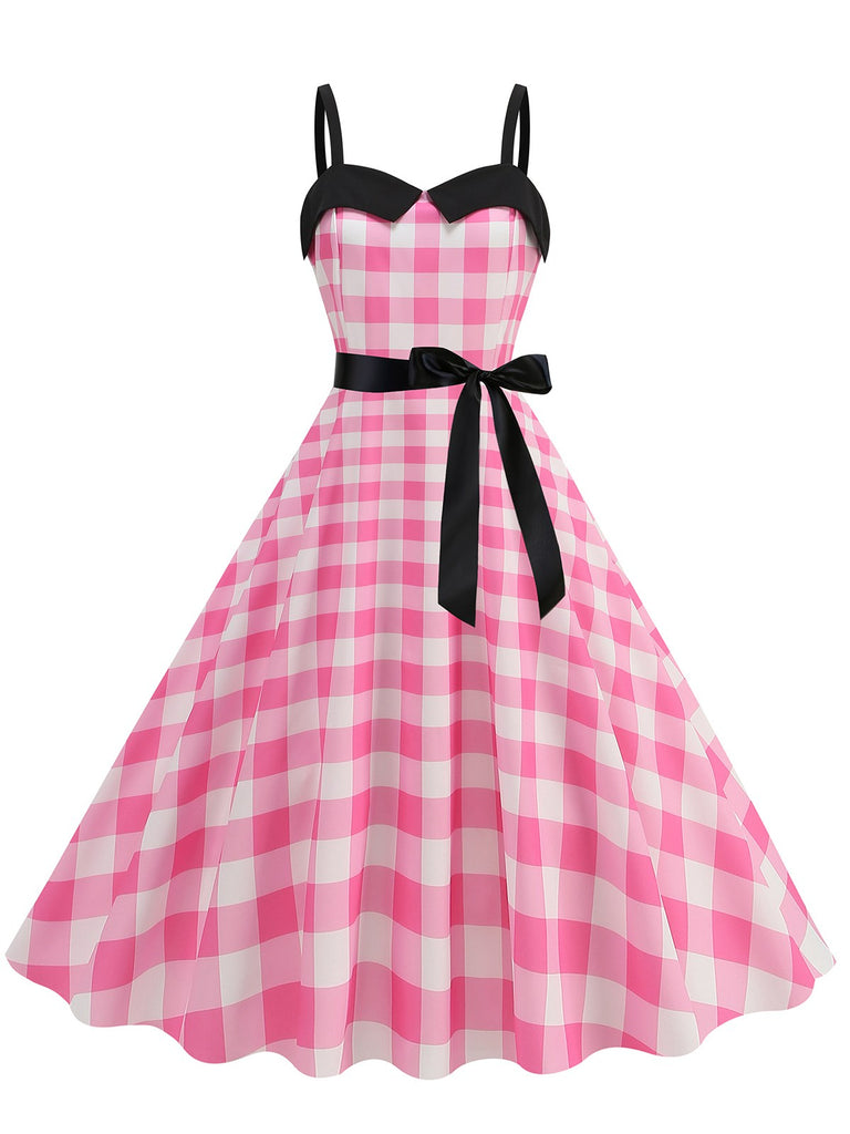 She slips into this Pink 1950s Plaid Patchwork Spaghetti Straps Dress and suddenly it's a 1950s daydream