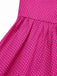 This Pink 1950s Polka Dots Halter Cotton Dress wraps her in 1950s elegance, one twirl at a time