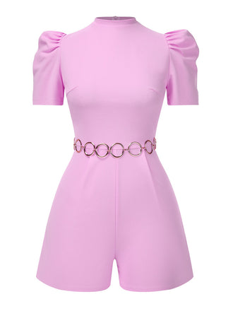 She adds this Pink 1950s Solid Puff Chain Belt Romper and suddenly it's 1950s perfection