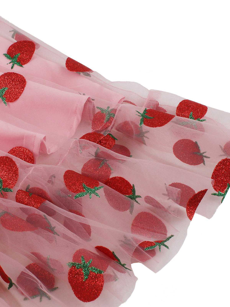 This Pink 1950s Spaghetti Strap Bow Strawberry Dress wraps her in 1950s elegance, one twirl at a time