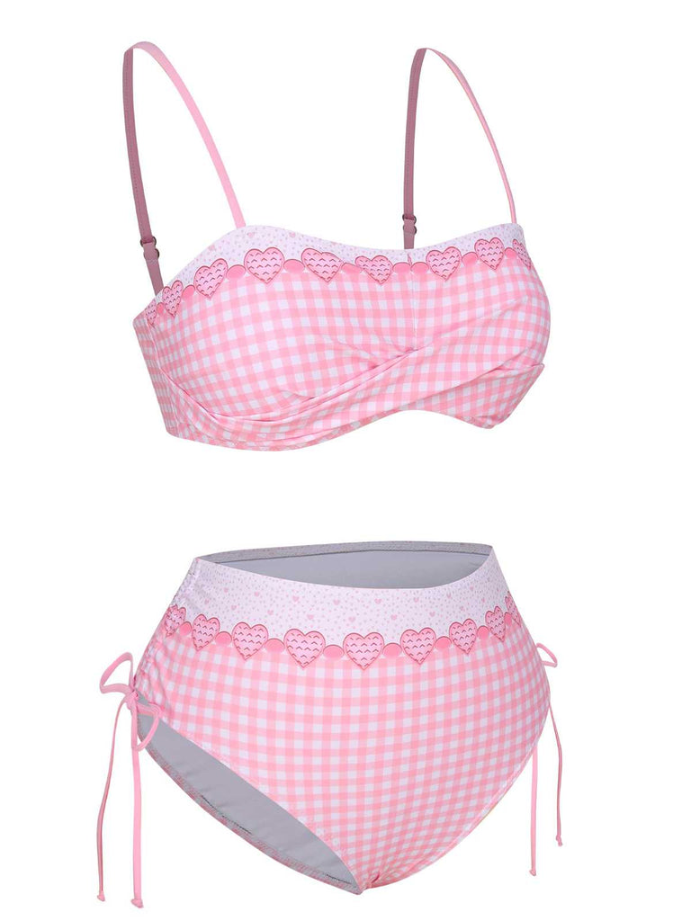 This Pink 1950s Spaghetti Strap Heart Plaids Swimsuit carries 1950s vacation dreams in every stitch