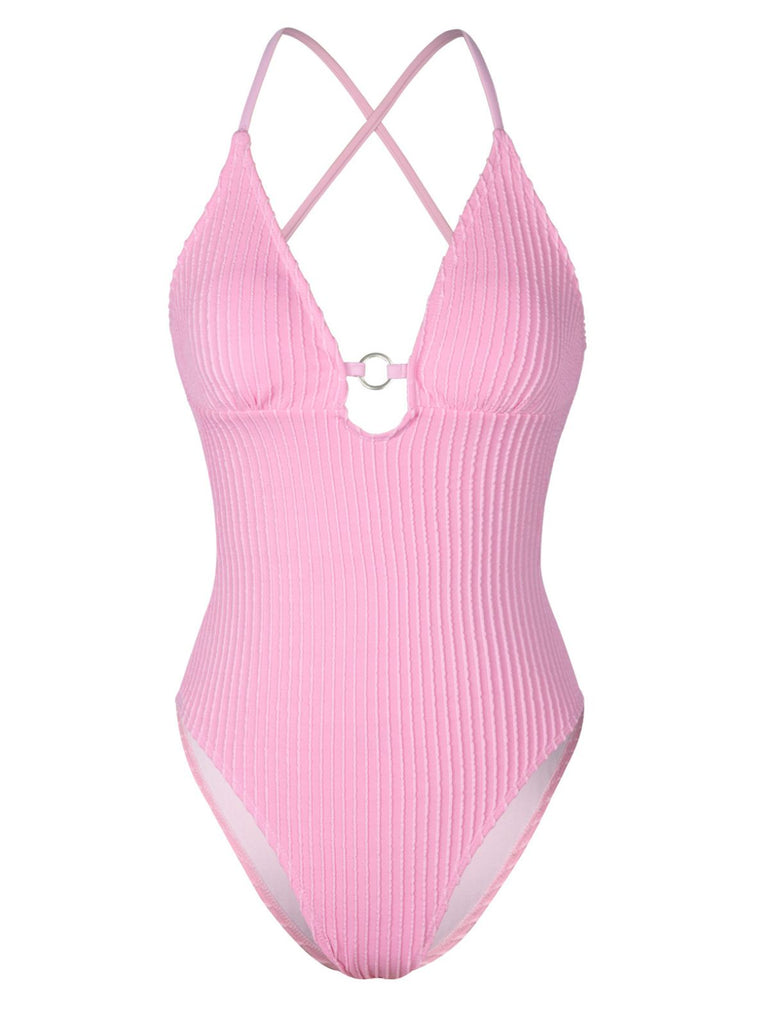 She's wearing Pink 1950s Spaghetti Strap High-Leg Solid Swimsuit and the whole beach remembers the 1950s