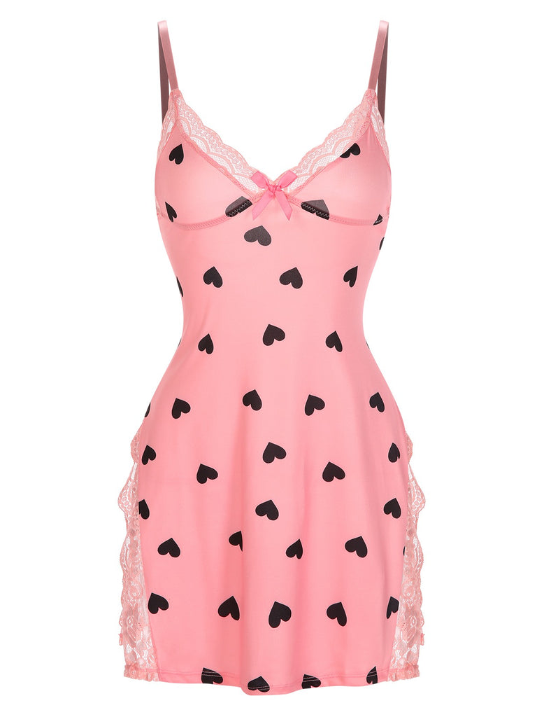 She slips into this Pink 1950s Spaghetti Straps Lace Hearts Nightgown and suddenly it's a 1950s daydream