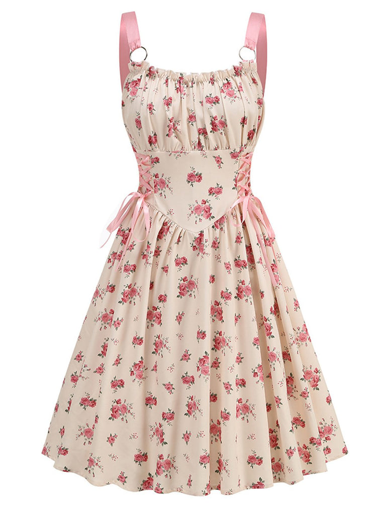 She slips into this Pink 1950s Strap Ditsy Floral Lace-Up A-Line Dress and suddenly it's a 1950s daydream
