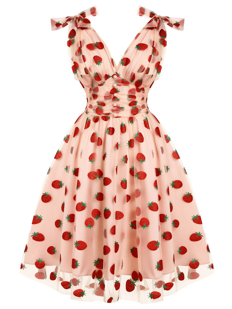 This Pink 1950s Strawberry Mesh Swing Dress wraps her in 1950s elegance, one twirl at a time