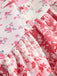Pink 1980s Spaghetti Strap Ditsy Floral Tiered Dress — the kind of 1980s dress that makes strangers smile