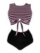 She's wearing Pink & Black 1970s Striped Waist Tie Patchwork Swimsuit and the whole beach remembers the 1970s