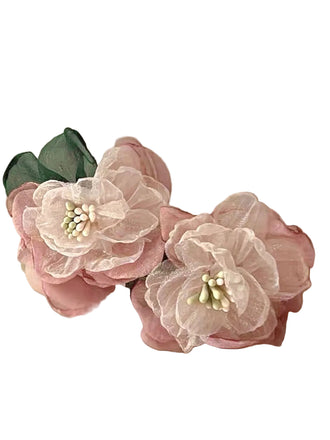She adds this Pink Vintage 3D-Floral Earrings and suddenly it's 1950s perfection