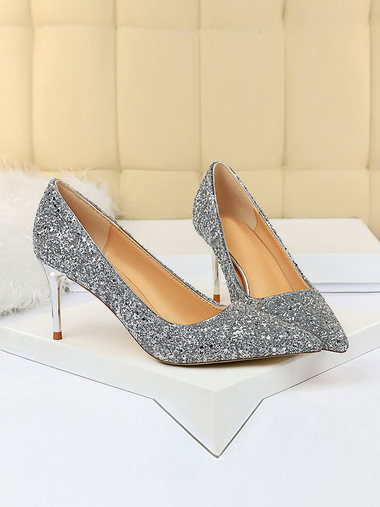 She finds her vintage story in this Pointed Toe Sequins Glitter High Heels Shoes