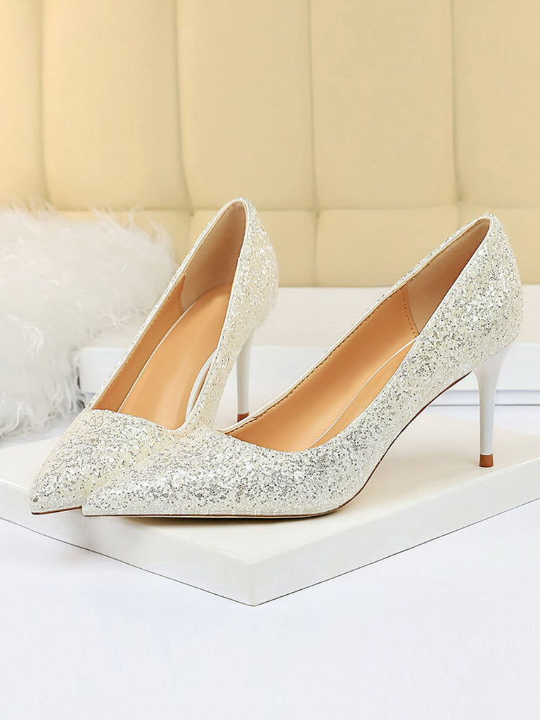 She finds her vintage story in this Pointed Toe Sequins Glitter High Heels Shoes