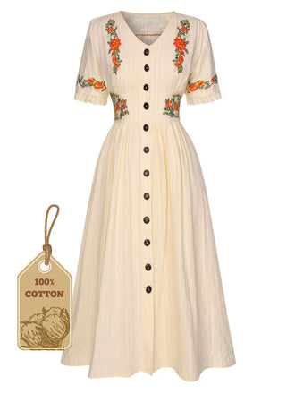 She slips into this Pure Cotton 1940s V-Neck Floral Dress and suddenly it's a 1940s daydream