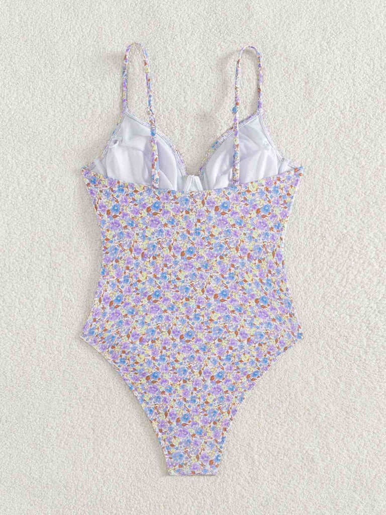 Purple 1950s Ditsy Floral Lace-Up One-Piece Swimsuit — because 1950s glamour never goes out of style